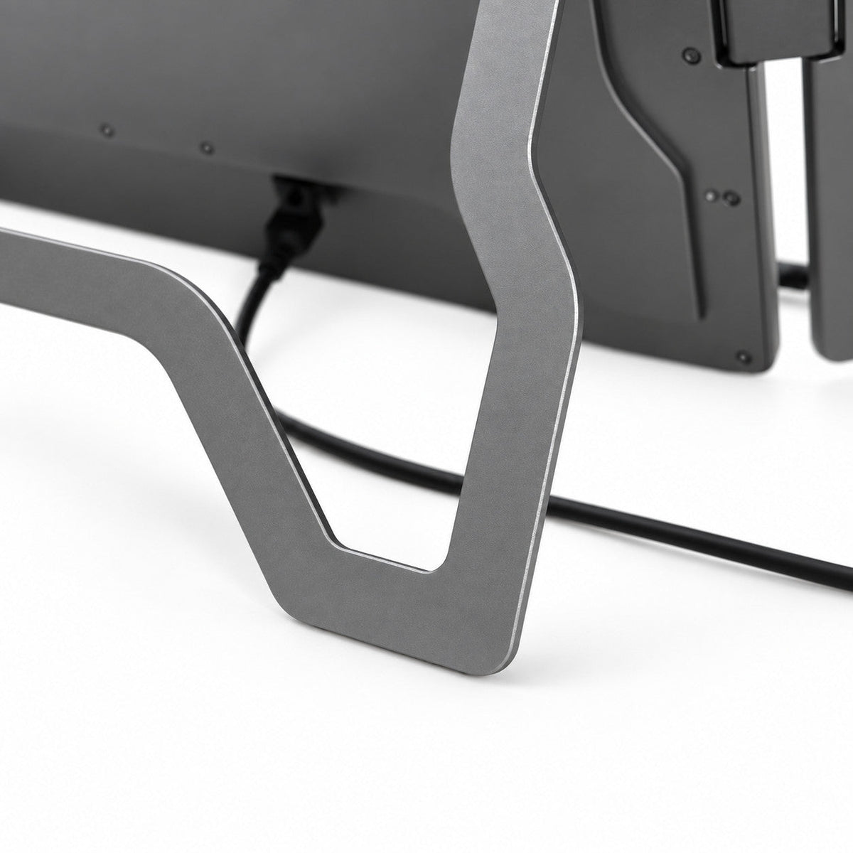 Close-up of the MagHub Trio Go 16 rear support stand and cable connection.